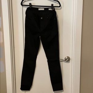 Mid rise black skinny jeans